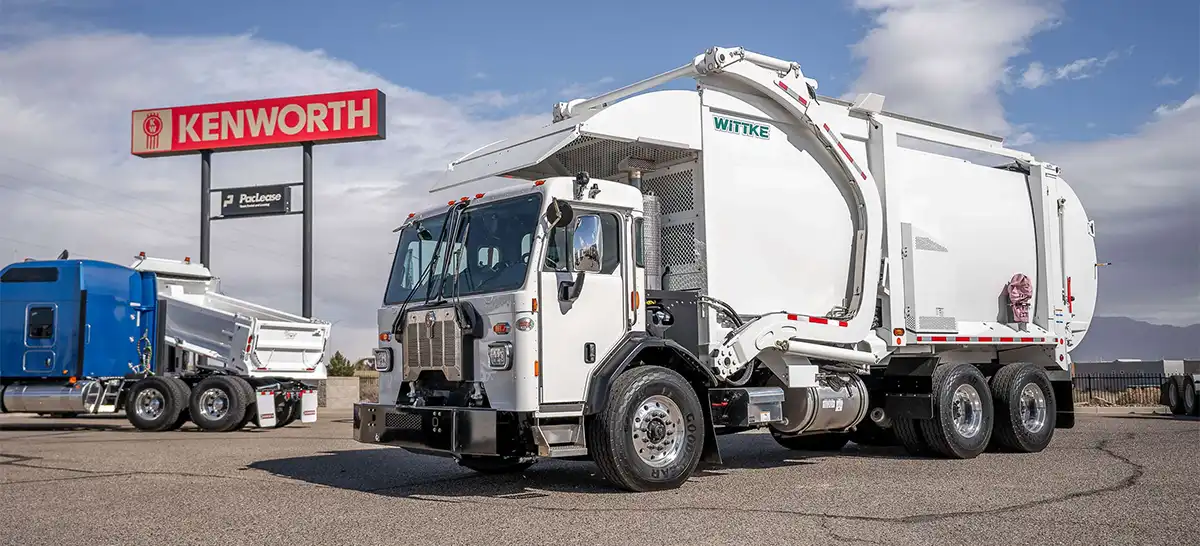 Kenworth L770 refuse truck with front loader body